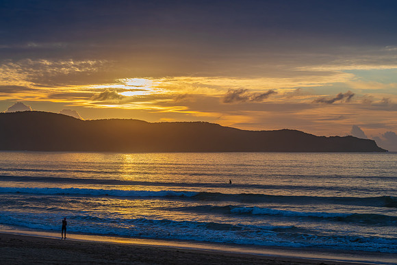 Sunrise seascape with clouds