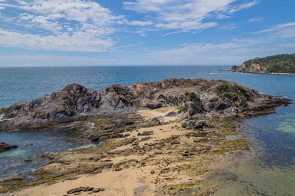 Daytime Aerial Seascape and Rock Formations