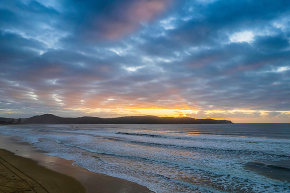 Cloudy aerial sunrise seascape