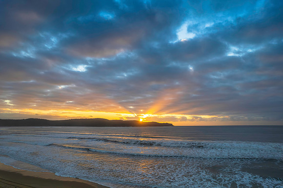 Cloudy aerial sunrise seascape