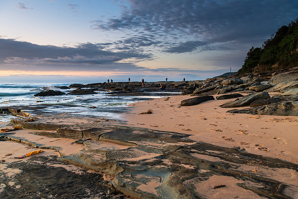 Rocky coastline sunrise seascape