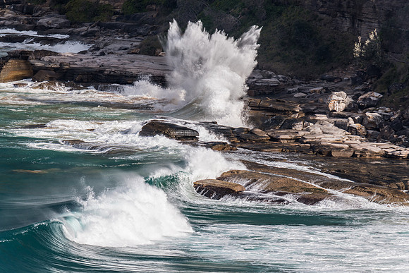 Waves washing on the rocks at Whale Beach