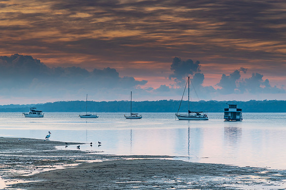 Sunrise Waterscape with High Cloud and Boats