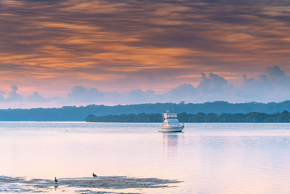 Sunrise Waterscape with High Cloud and Boats