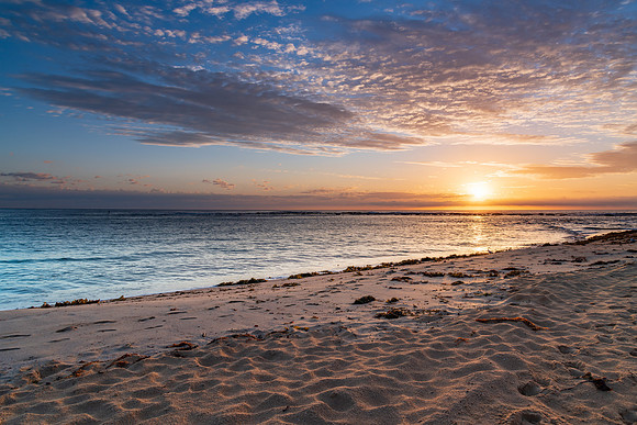 Sandy bay sunrise seascape