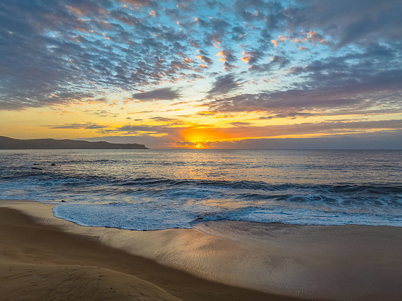 After the rain sunrise at the seaside