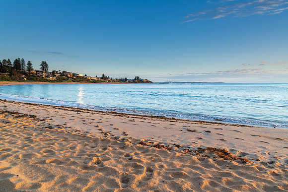 Sandy bay sunrise seascape