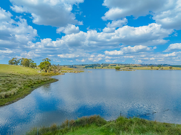 Lake Oberon on a beauitful Autumn Day with blue sky and white cl