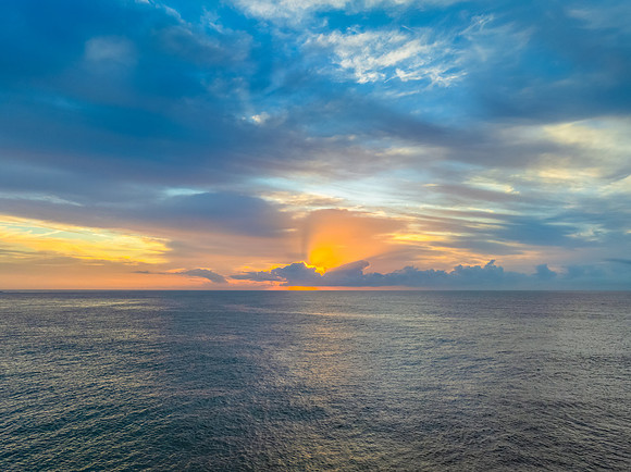 Aerial Sunrise Seascape Shrouded in Fog and High Clouds