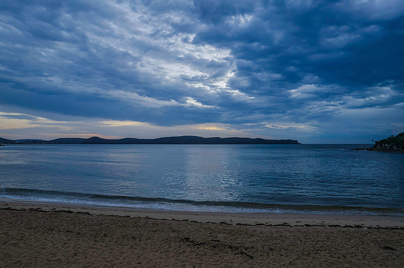 Cloudy sunrise seascape as a storm moves on
