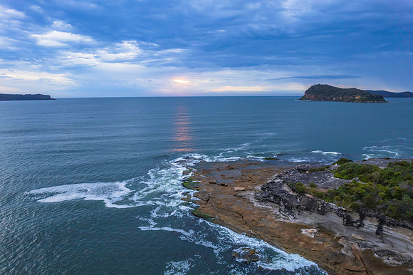 Cloudy sunrise seascape as a storm moves on