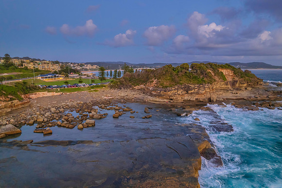 Aerial Sunrise Seascape at Rocky Inlet with clouds