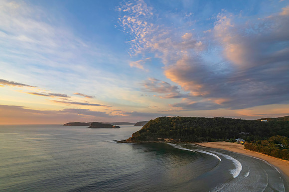 Sunrise seascape with a mix of high and medium clouds