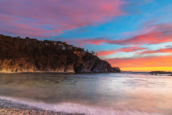 Colourful High Cloud Sunrise Seascape and Rock Formations