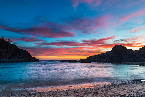 Colourful High Cloud Sunrise Seascape and Rock Formations