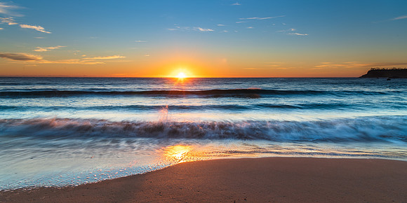South Coast Sunrise Seascape and light high cloud