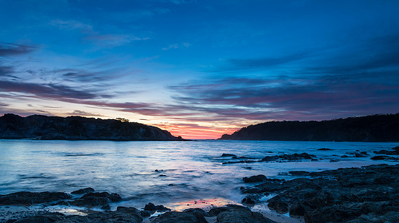 Colourful High Cloud Sunrise Seascape Panorama and Rock Formatio