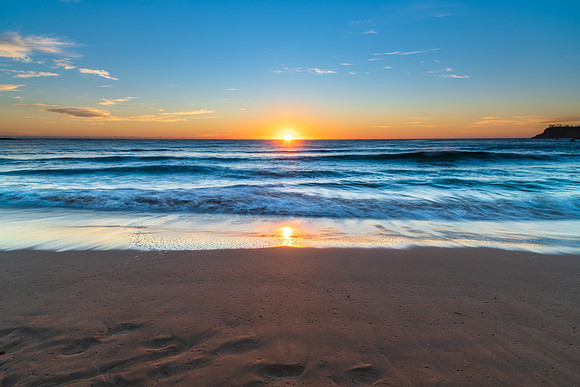 South Coast Sunrise Seascape and light high cloud