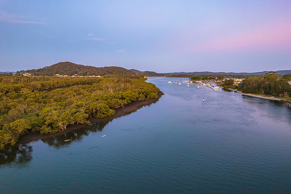 Sunset waterscape with boats