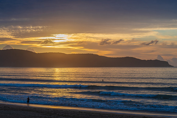 Sunrise seascape with clouds