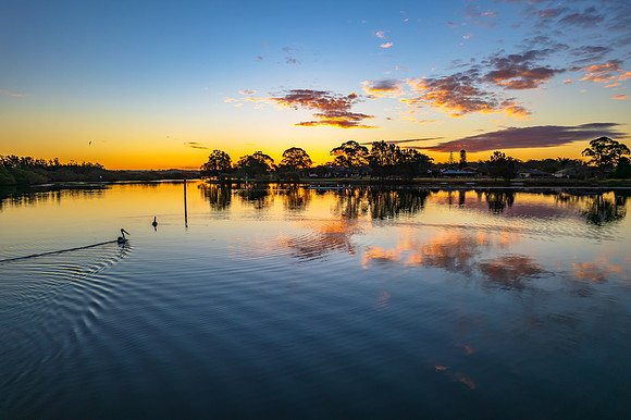 Ohmas Bay Sunset with Clouds and Reflections