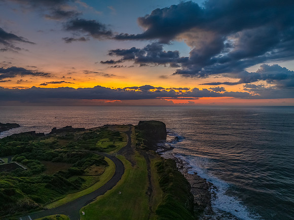 Aerial sunrise views over Bombo Beach at Kiama