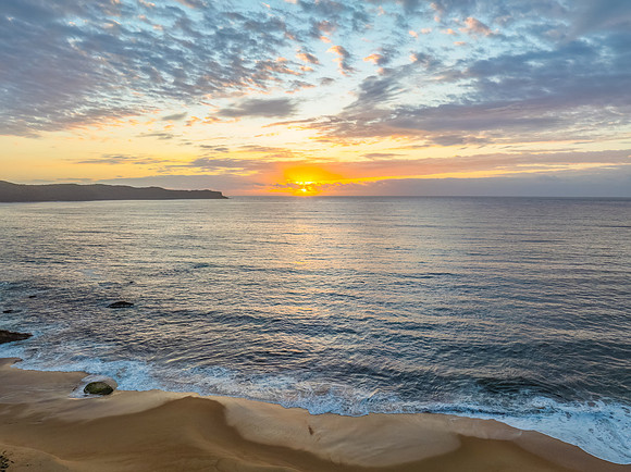 After the rain sunrise at the seaside