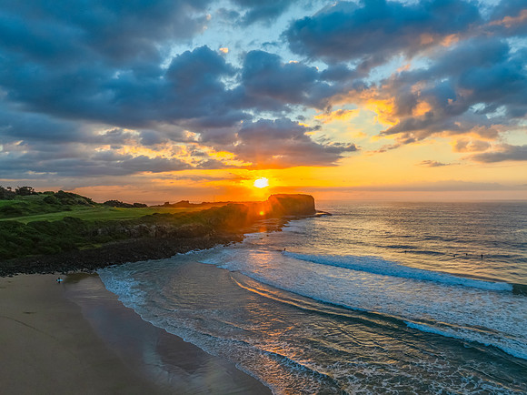 Aerial sunrise views over Bombo Beach at Kiama