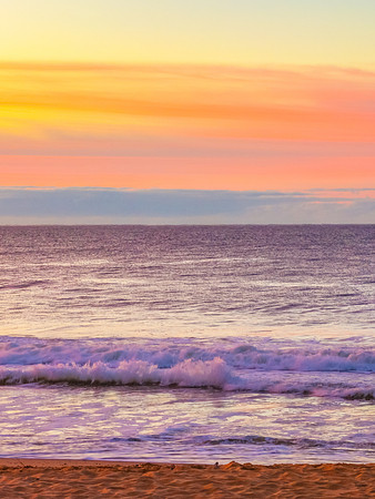 Winter seascape views over the beach with high and medium cloud