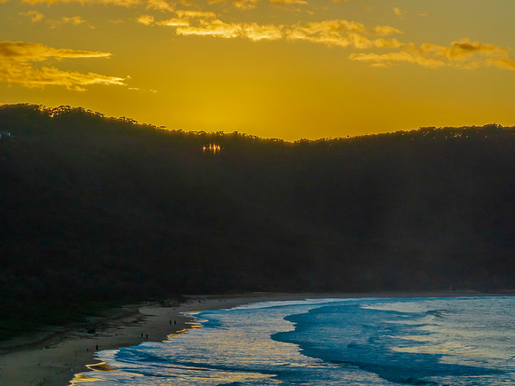 Aerial sunrise at the beach with clouds