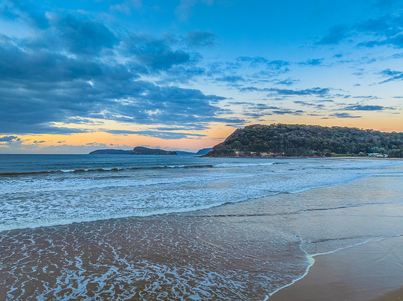 Sunrise seascape with low clouds