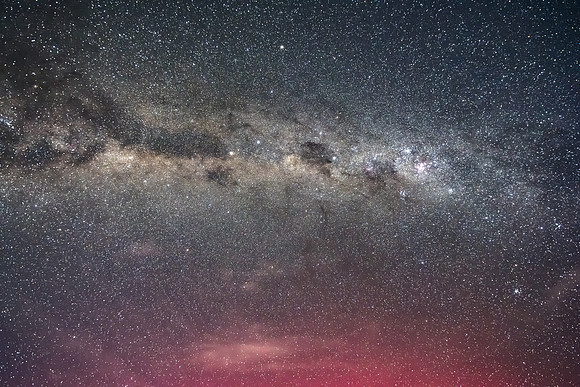 Aurora Australis tinged Milky Way night sky