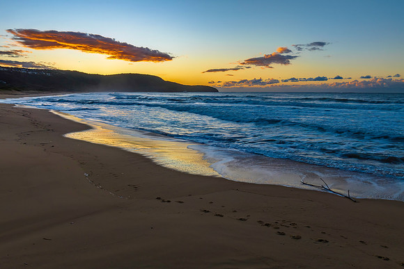 Aerial sunrise at the beach with clouds