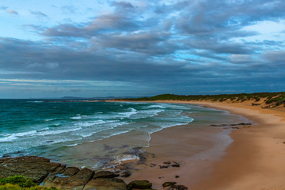 Sunrise seascape with strong southerly winds