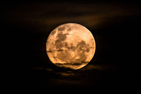 June's Full moon, Strawberry Moon with bands of clouds