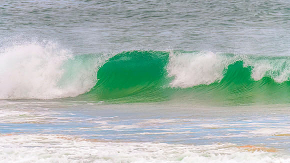 Wave curling over on the ocean
