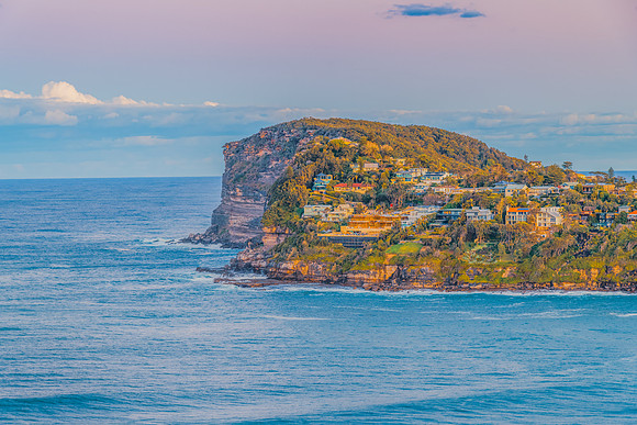 Sunset views over Whale Beach with clouds