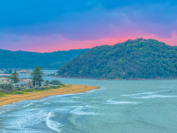 Sunrise seascape with low clouds