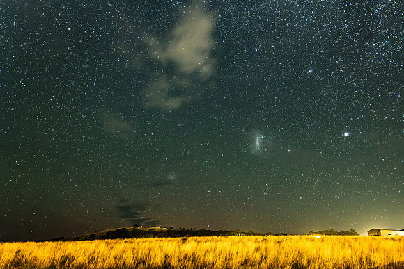 The Milky Way Galaxy with some light cloud