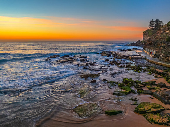 Sunrise at the Seaside with an Orange Horizon