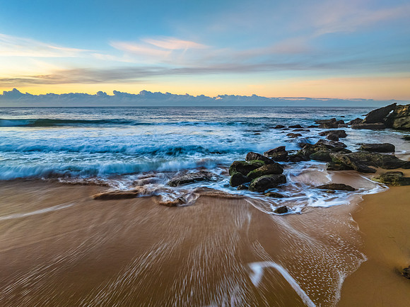 Sunrise seascape views with high cloud