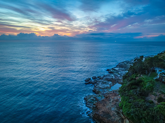 Dawn Seascape in pinks and blue with High Clouds