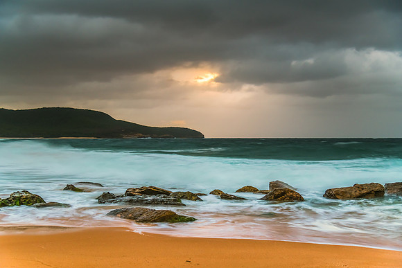 Moody morning sunrise at the seaside