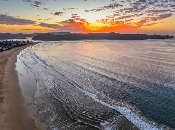 Sunrise seascape with pretty clouds in the sky