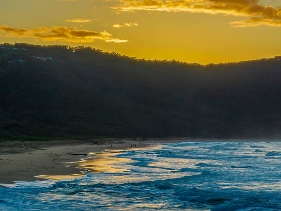 Aerial sunrise at the beach with clouds
