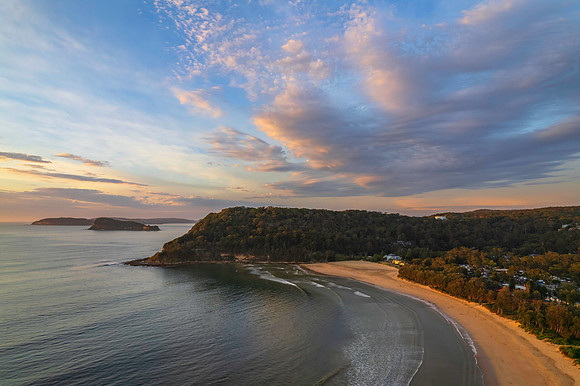 Sunrise seascape with a mix of high and medium clouds