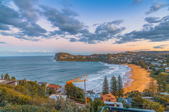 Sunset views over Whale Beach with clouds
