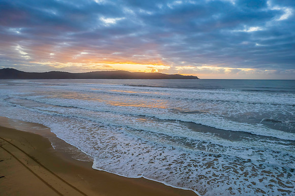 Cloudy aerial sunrise seascape