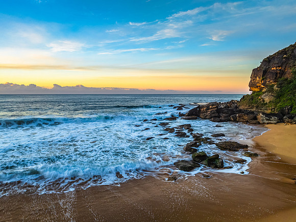 Sunrise seascape views with high cloud