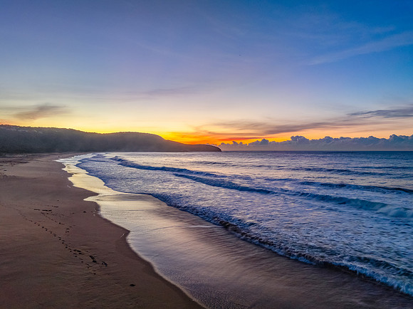 Sunrise seascape views with high cloud